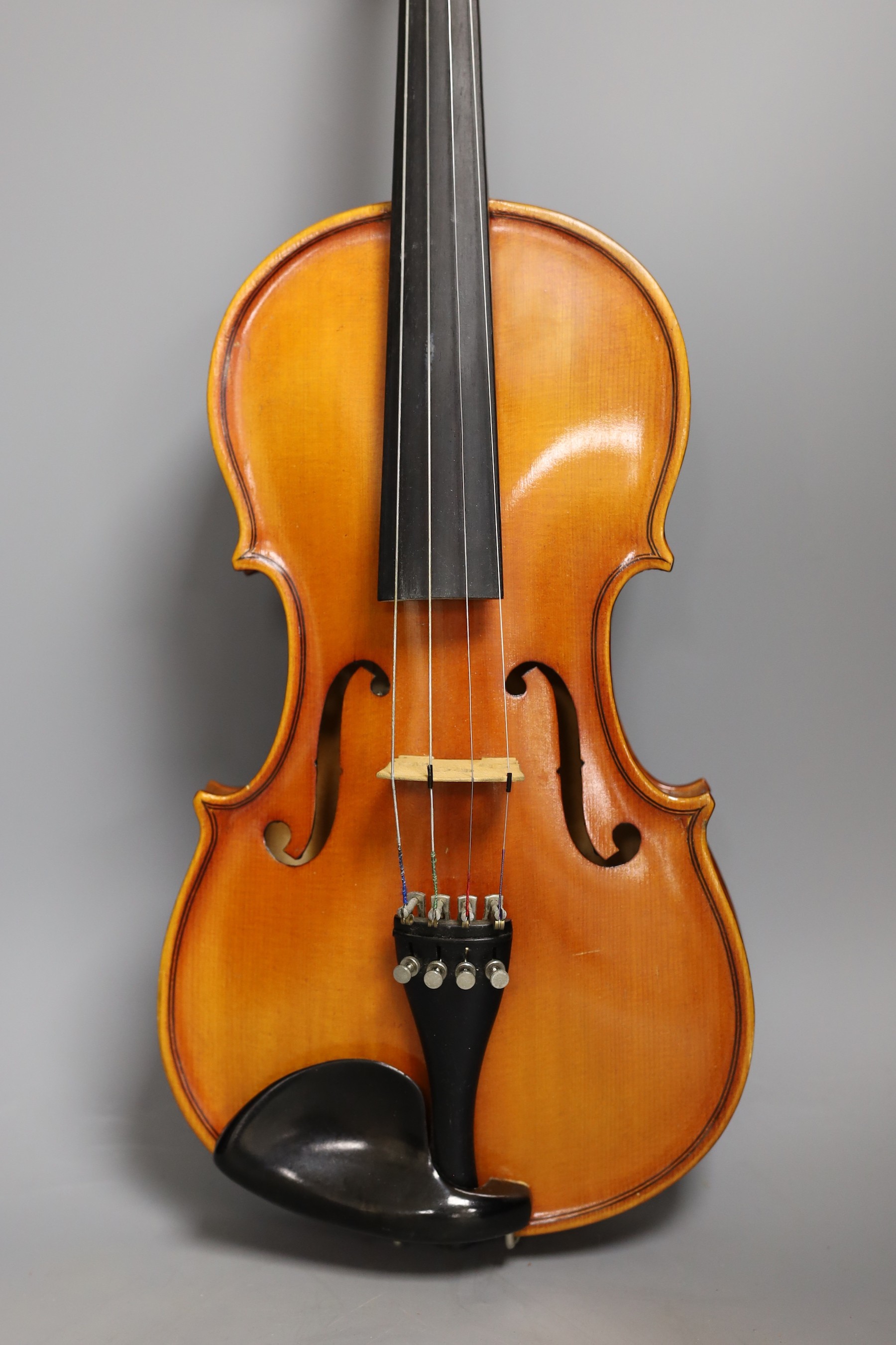 A cased child's violin and bow with ivorine tip, violin 55cms long, - Image 3 of 10