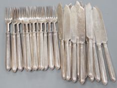 A set of twelve pairs of Edwardian silver fish eaters, Matin, Hall & Co, Sheffield, 1909, knife 21.