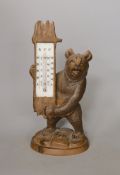 A Black Forest carved bear thermometer, 31cm