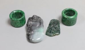Two Chinese green hardstone archer's rings, together with a jadeite carving of Zhong Qui and