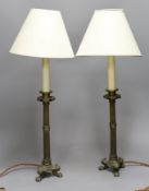 A pair of Empire style brass table lamps,31 high not including light fitting,