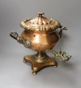 A Victorian copper tea urn
