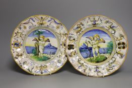 A pair of Italian maiolica plates, by Cantagalli, cockerel marks, 22cm diameter