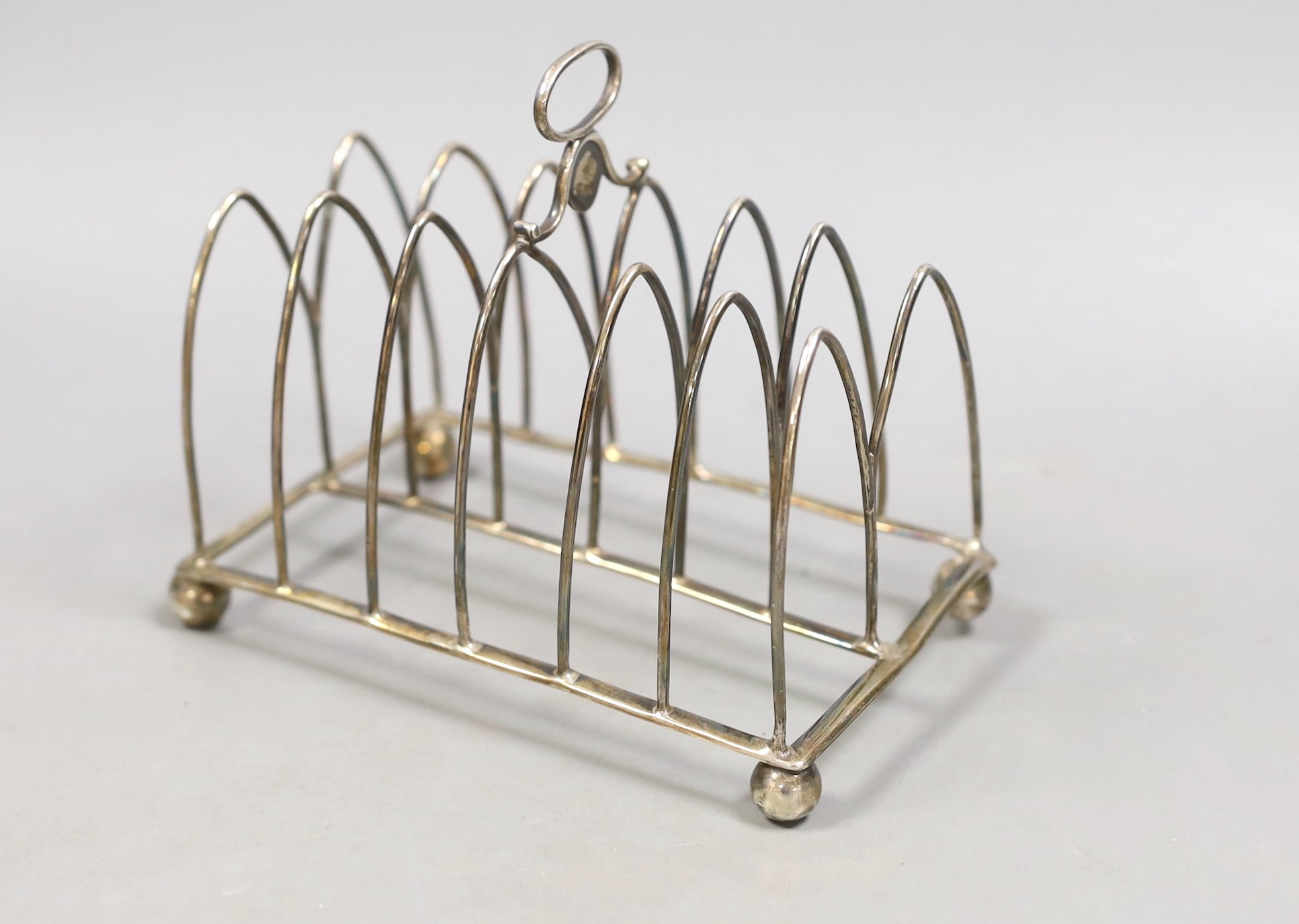 A George III silver seven bar toastrack, Soloman Hougham, London, 1805. length 15cm, 180 grams, (a.