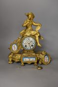 A 19th century French gilt brass figural mantel clock a.f., 32cm