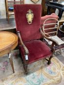 An 18th century style French carved walnut upholstered elbow chair, width 64cm, depth 60cm, height