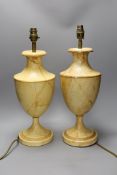A pair of faux marble toleware style lamps,41 cms high not including fittings,
