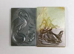 A Chinese russet and pale celadon jade plaque, 6.2cm and another green jade plaque