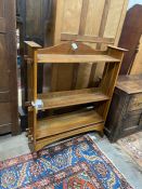 An Arts & Crafts oak open bookcase, length 100cm, depth 26cm, height 118cm