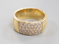 A modern yellow metal (tests as 18ct) and part pave set diamond ring, size R/S gross weight 13.4