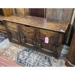 A late 18th century oak low dresser, the frieze with a small later added drawer, length 157cm, depth