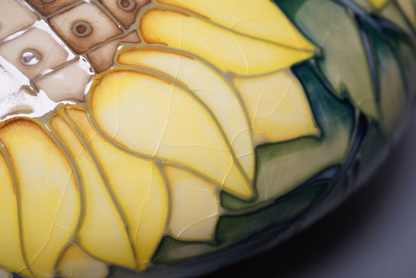 A Moorcroft pottery vase of compressed form, decorated in the "Sunflower" pattern, 20cm - Image 4 of 6