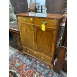 A George III mahogany press cupboard, width 115cm, depth 55cm, height 142cm