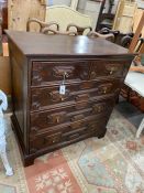 A 19th century oak panelled chest of drawers with chestnut lining, width 97cm, depth 55cm, height