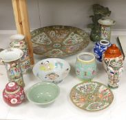 A Chinese famille charger, three vases and a plate, together with other Chinese and Japanese
