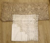 An large ecru continental hand worked table cloth and smaller linen cloth with a deep crochet edge,