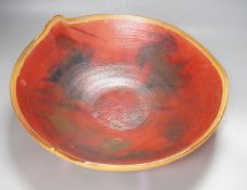 A large red French Studio glass dish, 40cm diameter