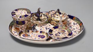 A collection of Royal Crown Derby and Crown Derby wares, including a cabaret tray, two ring