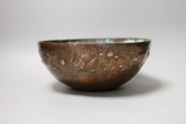 A Newlyn style planished copper ‘fish’ bowl,24.5 cms diameter,
