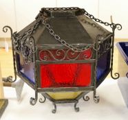 Large Victorian style hexagonal wrought iron hanging lantern with stained glass