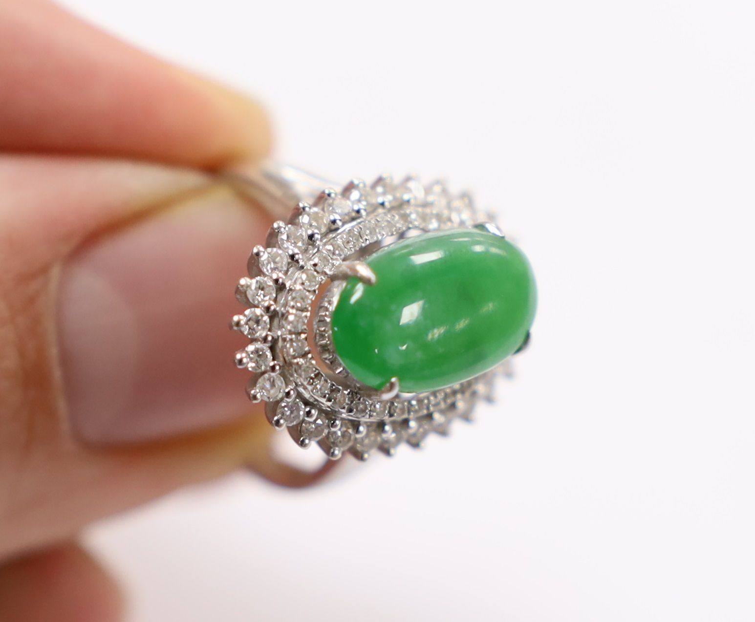 A modern 18k white metal, cabochon jade and two row diamond chip set oval cluster ring size L, gross - Image 6 of 8