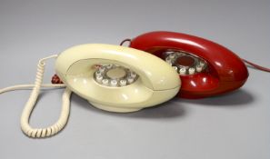 Two Autophon telephone handsets, AUG002 and AUG005,24 cms wide,