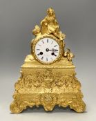 A 19th century French ormolu mantel clock, Henri Marc movement with silk suspension, and pendulum