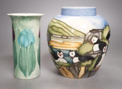 A Moorcroft pottery jar, decorated with puffins and a Jersey pottery "mini tulips’ vase, tallest