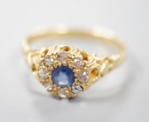 An early 20th century yellow metal, sapphire and diamond set cluster ring (stone missing), size P/Q,