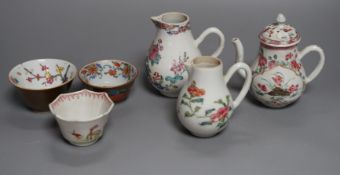 Three Chinese export famille rose cream jugs, one with pierced cover and three small bowls, 18th