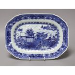 A Chinese blue and white octagonal dish, painted with a pavilion and a bridge, 25cm long