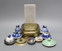 A collection of various Chinese porcelain lids/covers, a clobbered blue and white tea bowl, a