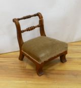 A 19th century mahogany child's chair