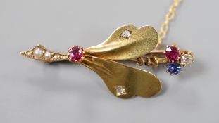 An Edwardian yellow metal, ruby sapphire, seed pearl and diamond set leaf brooch, 39mm, gross weight