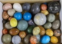 A marble egg and ball collection