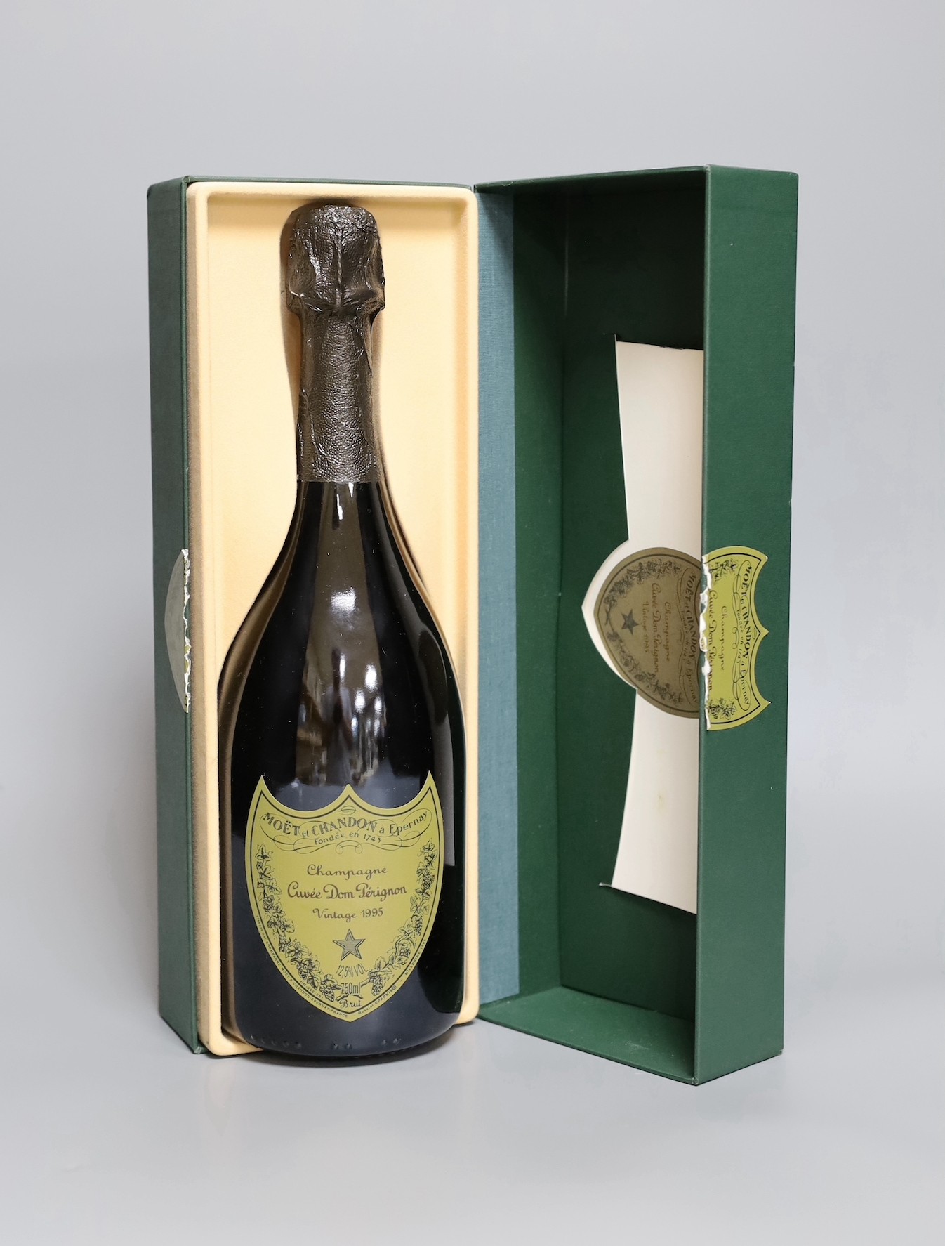 A cased bottle of Cuvée Dom Pérignon vintage 1995