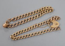 A 9ct curb link bracelet and a yellow metal curb link bracelet with 15ct clasp, gross weight 10.1