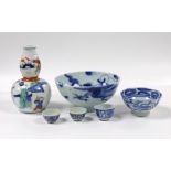 A selection of small Chinese ceramics, to include a blue and white dragon bowl, 6cm tall, a double