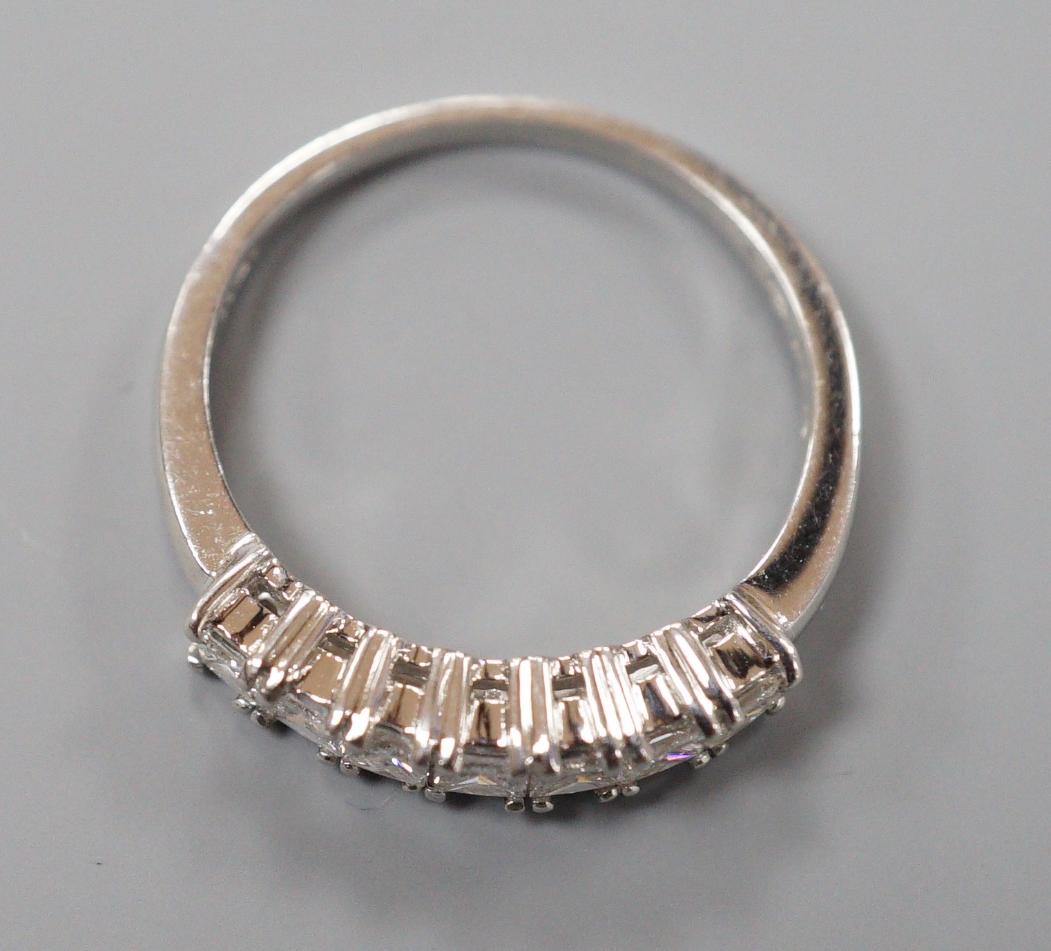 A modern platinum and seven stone princess cut diamond set half hoop ring, size M/N, gross weight - Image 3 of 4