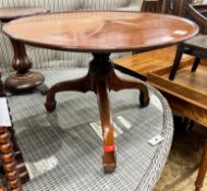 An early Victorian mahogany dish top tea table, diameter 69cm, height 47cm (cut down, converted from