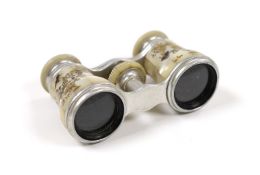 A pair of Victorian silvered metal opera glasses, with shibayama inlaid mother o'pearl lens barrels,