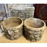 A pair of circular reconstituted stone garden planters, diameter 31cm, height 25cm together with a