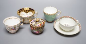 A small bone china pot pourri, 1812-22, a relief moulded teacup and saucer, and three cups