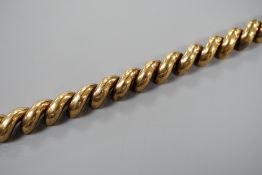 A 375 yellow metal hollow link bracelet, 18.5cm, 21.9 grams.