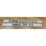 Hanging wood signs: 'Trinidad Tour 1974' and ‘Felbridge [L.O.S.C.] R.U.F.C.’, 183cm long