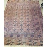 A Bokhara red ground rug, 200 x 148cm