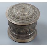 A 19th century Shan people white metal circular betel box and cover, Eastern Burma, height 10.5cm,