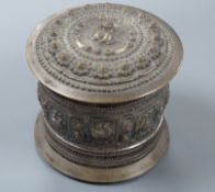 A 19th century Shan people white metal circular betel box and cover, Eastern Burma, height 10.5cm,