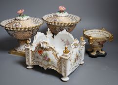 A pair of 19th century continental porcelain tazzas together with a smaller example and planter (4),