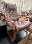A 1970's Danish style buttoned brown leather and beech bentwood chair, width 69cm, depth 80cm,